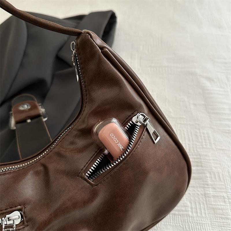 Premium Sense Niche Bag Women's Large Capacity 2025 New Retro Autumn and Winter Messenger Bag Casual Commuter Dumpling Bag