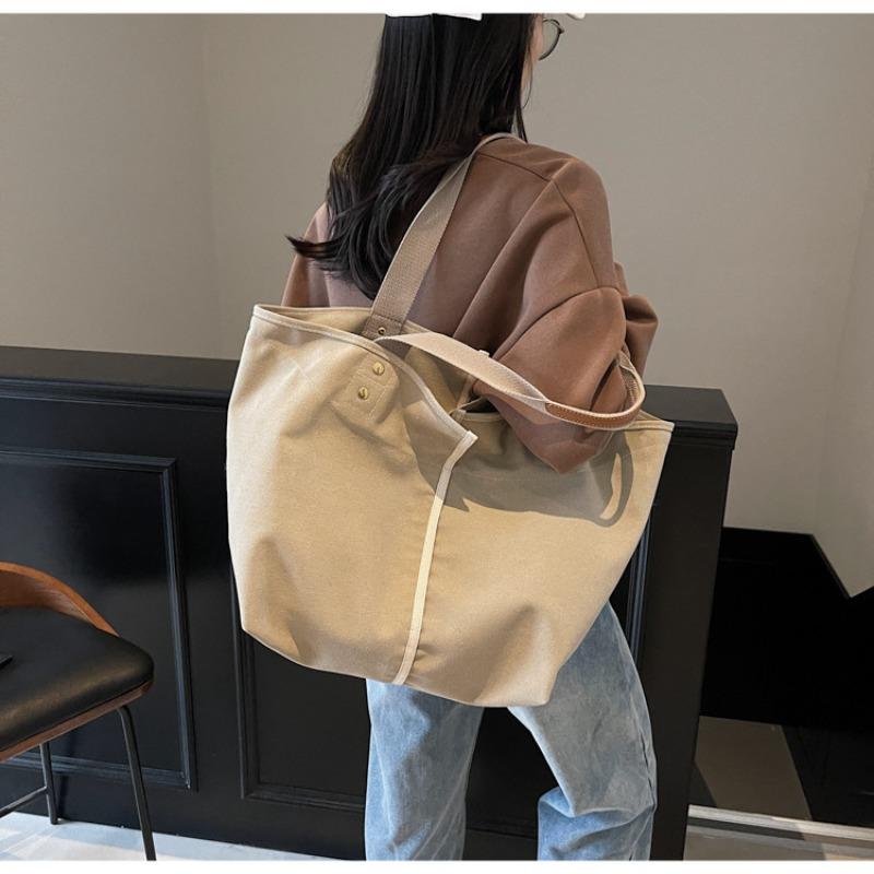 Simple literary tote bag women's spring leisure large-capacity shoulder bag commuter versatile underarm bag