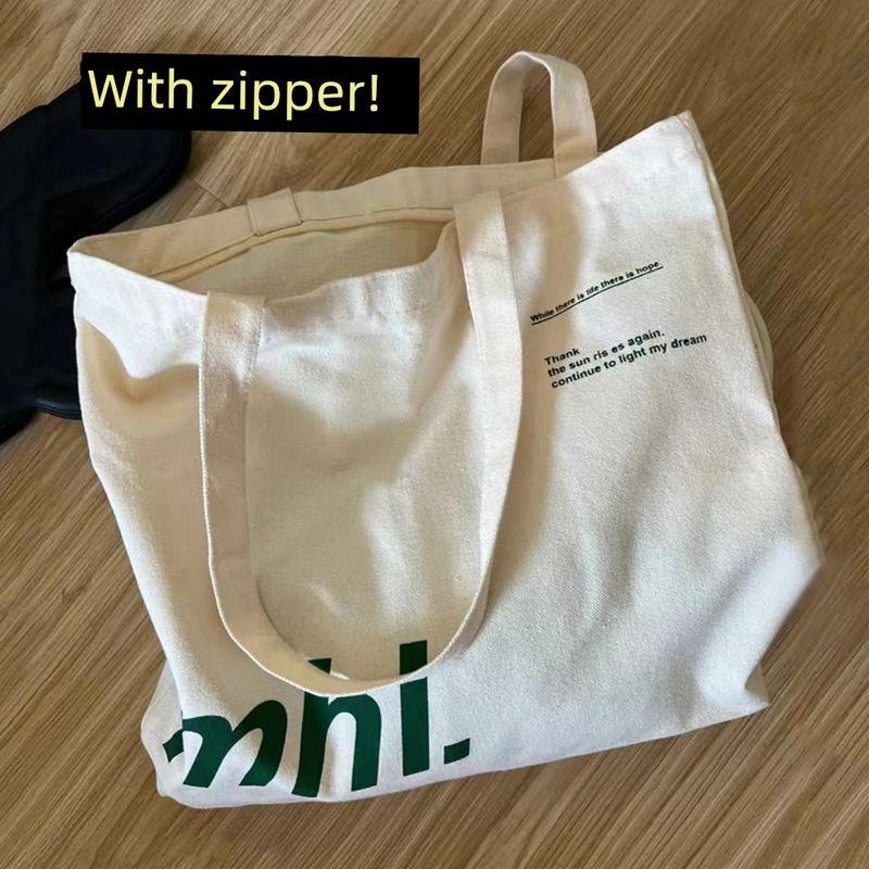

Japanese Style Lazy Canvas Bag Ins Artsy Minimalist Large Capacity Korean Style Single Shoulder Female Chic Student Handbag Green letter mhl [zipper]]
