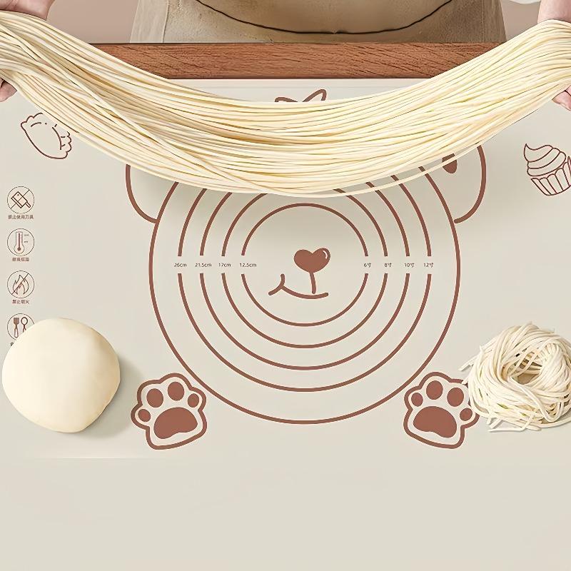 Thickened silicone baking mat with scale design, non-stick and anti-slip. Easy to clean, ideal for dough kneading and counter protection.
