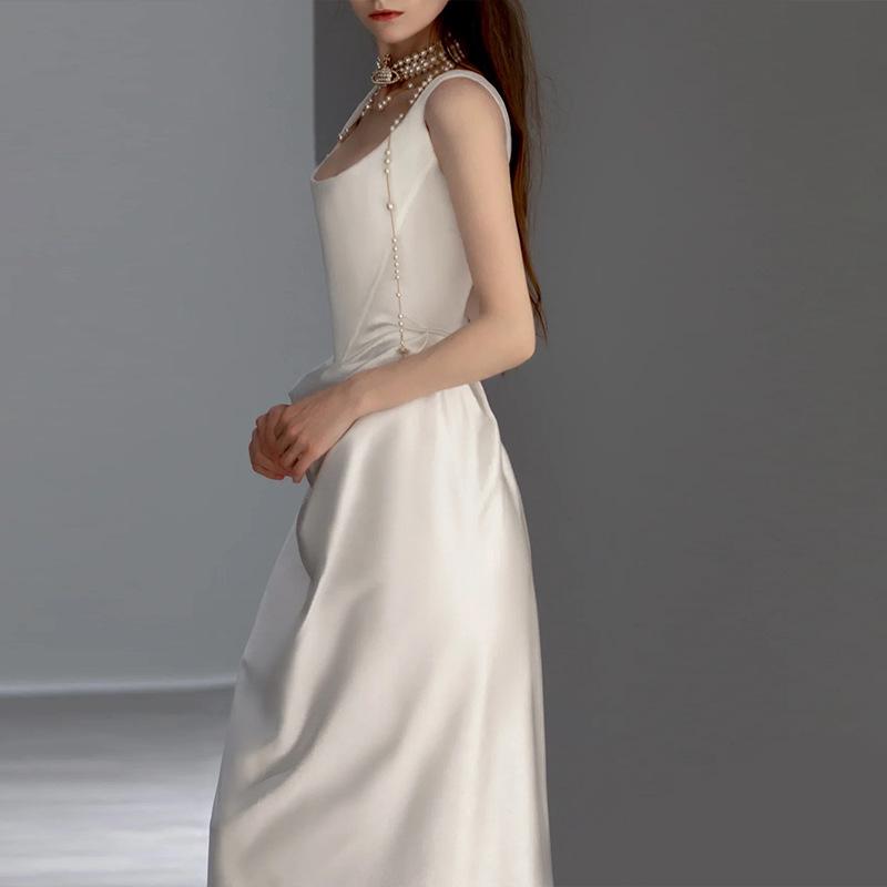 Retro Satin Light Wedding Dress - Simple Spaghetti Strap Gown with Small Train