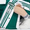 Adidas Originální kalhoty Adibreak s bočními patentkami a pruhovaným patchworkem Dámské spodky Lesní zeleň IR9792