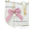Large Bow Faux Pearl Bracelet Keychain with Colored Woven Strap and Alloy Tag Pendant