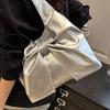 Korean version of casual underarm women's bag 2025 new simple bow design sense tote bag simple portable shoulder bag