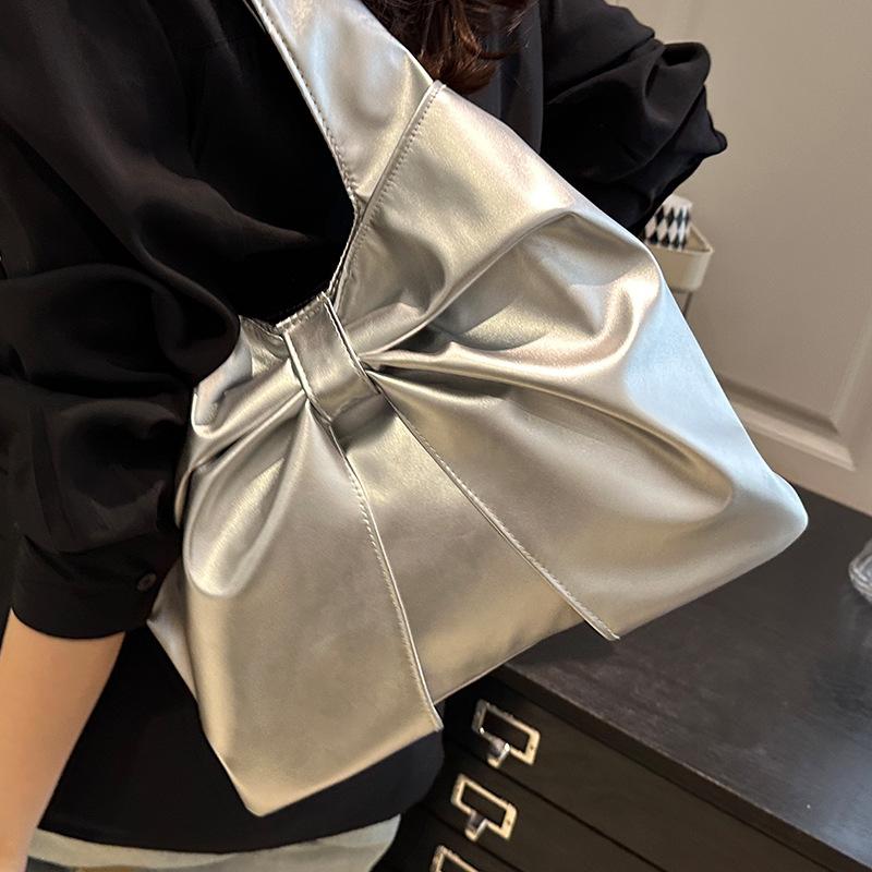 Korean version of casual underarm women's bag 2025 new simple bow design sense tote bag simple portable shoulder bag