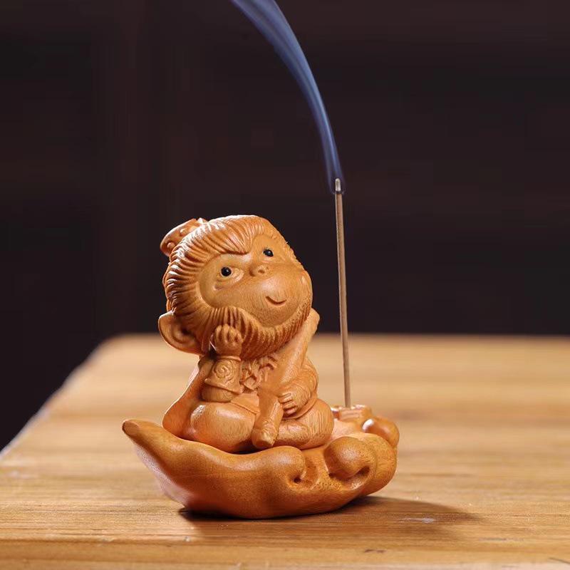 Green Sandalwood Monkey King Incense Holder with Base - Creative Zen Tea Pet Ornament for Desktop and Office.