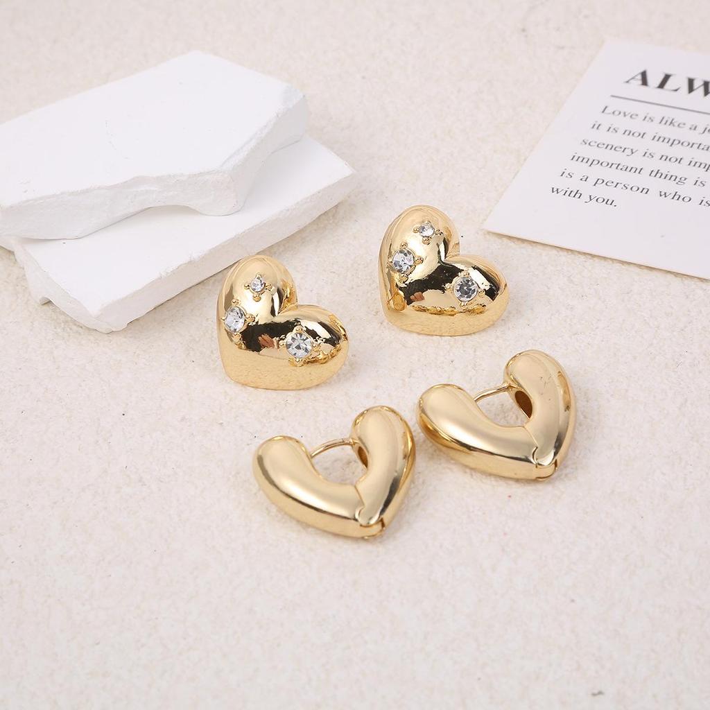Gold Heart Hollow Earrings - Niche Design, High-End Cold Style, Small Studs