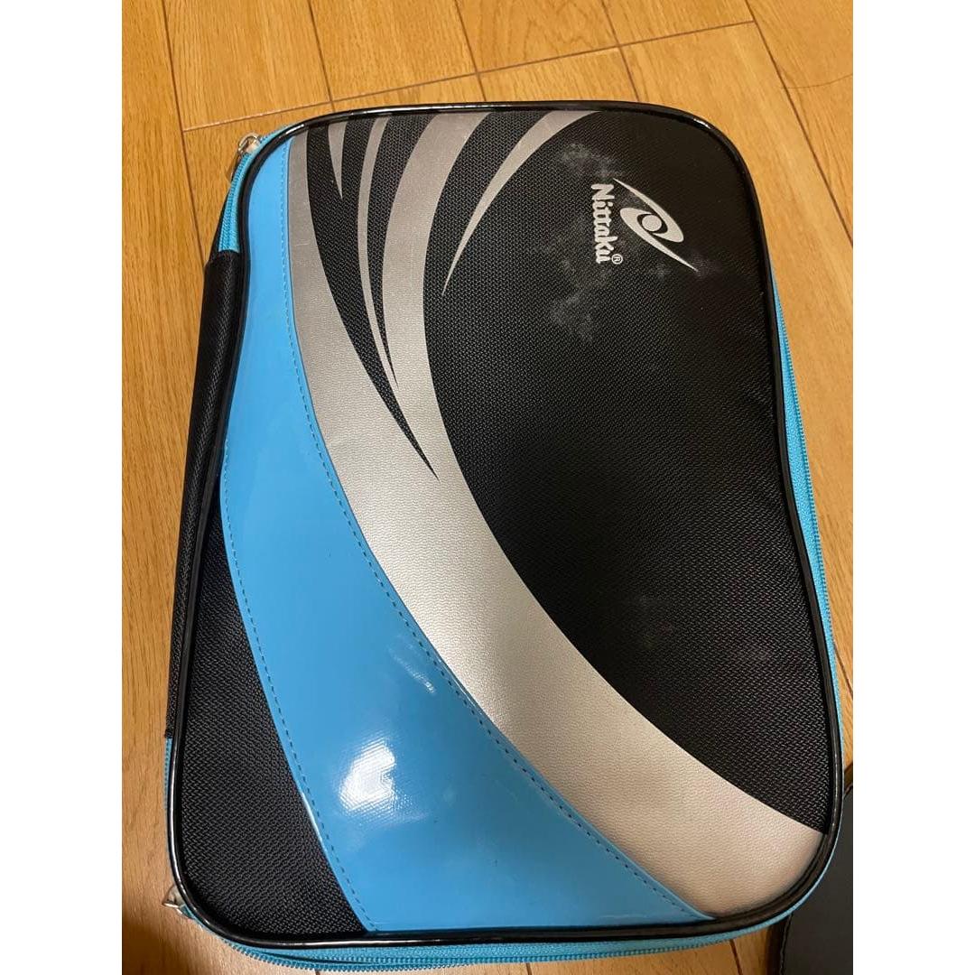 Used Nittaku table tennis bag, racket