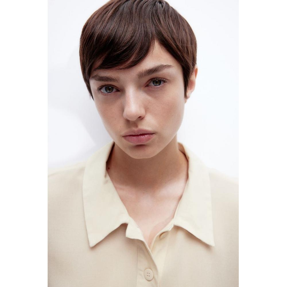 

Рубашка-поло из крепа HM Sheer светло-бежевая