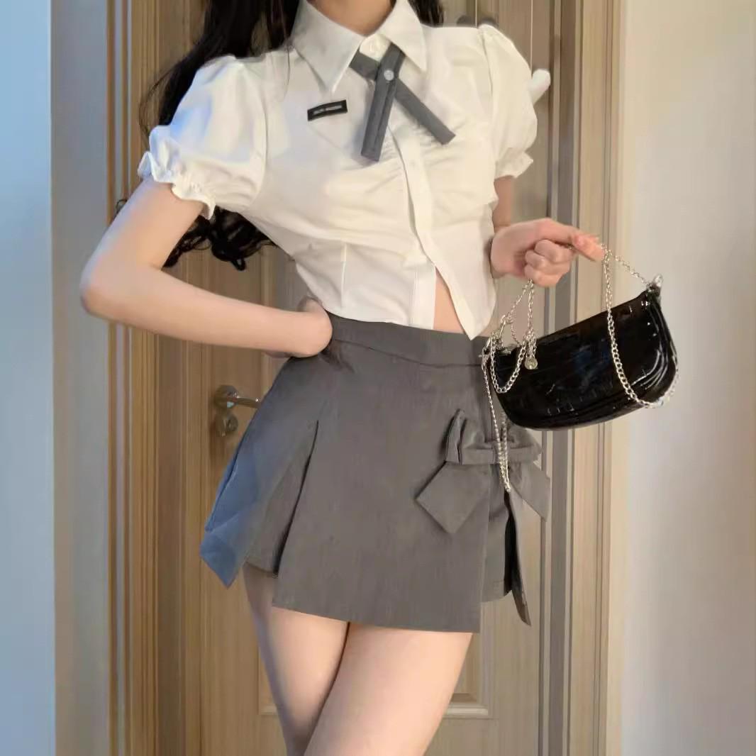 

Женская летняя юбка А-силуэта с высокой посадкой и уникальным дизайном с бантом XS серый