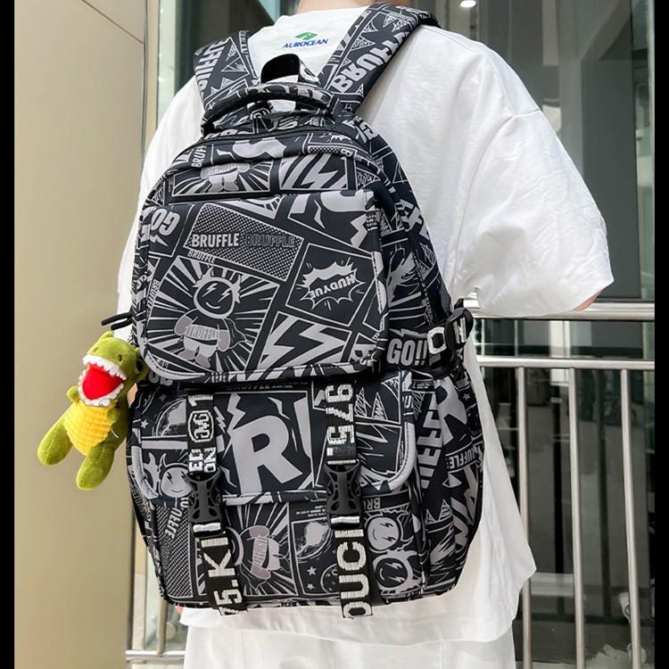 Schoolbag Wholesale New Version of Junior High School Student Schoolbag Graffiti Word Sports Large Capacity Men's and Women's Backpack Storage