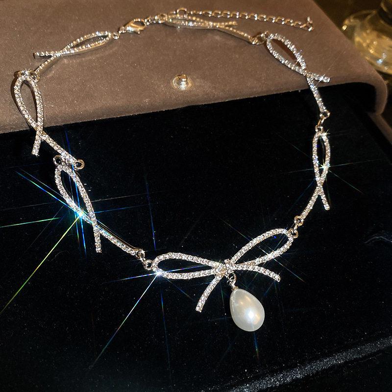 Korean Sweet Rhinestone Bow & Pearl Necklace: Elegant, High-End Clavicle Chain for Women