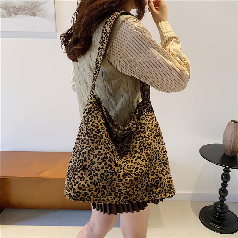 Tasche mit Leopardenmuster Damen große Kapazität 2025 neu Herbst und Winter Freizeit Canvas Schulter-Einkaufstasche Klasse Pendler Tragetasche