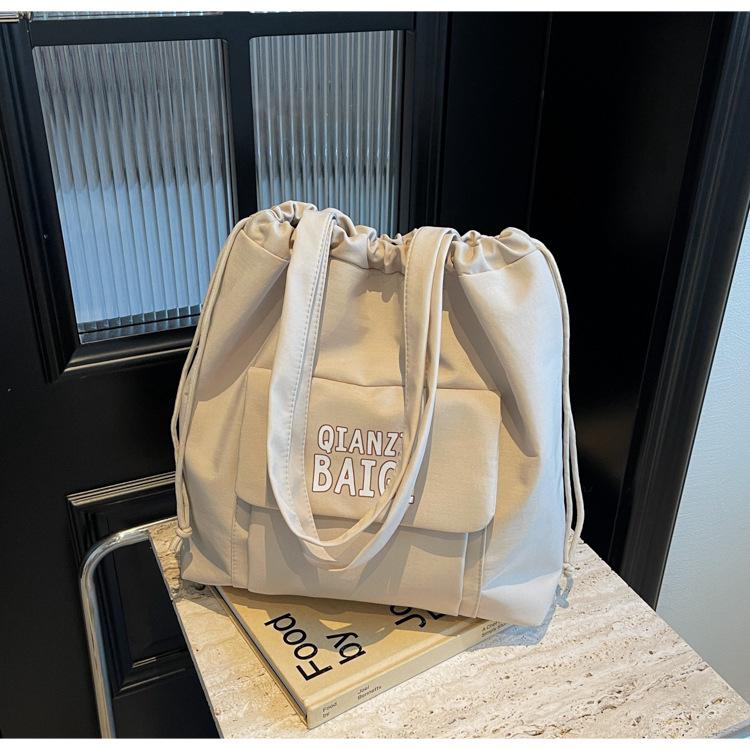 

Новый фаворит моды! Сумка-ведро в стиле ретро, простая текстура, элегантная для женщин, которые ездят на работу белый