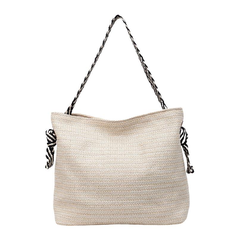 A Laid-back Single-shoulder Casual Grass-woven Beach Bag for Women A Versatile Commuter Underarm Bag