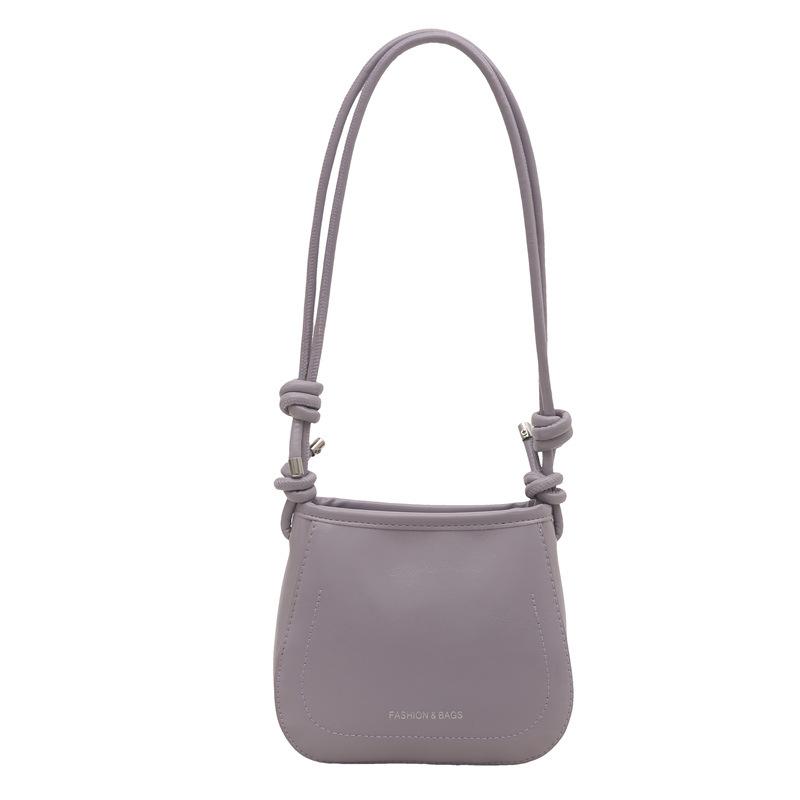 

Korean version of fashionable underarm bag women s new simple hand shoulder bag PU texture foreign style messenger small square bag фіолетовий
