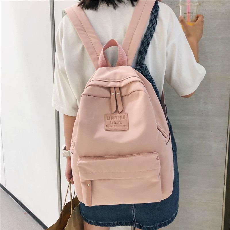 This New Backpack Is a Trendy and Fashionable Backpack for College Students and Junior High School Students with Large Capacity Schoolbags.