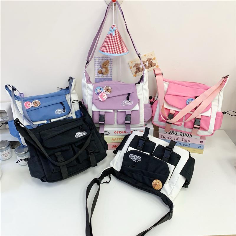 Spring and summer new messenger bag men's trendy brand large capacity ins shoulder bag Japanese casual mailman bag versatile small satchel