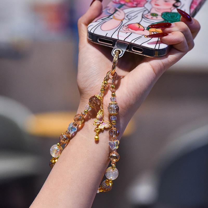 Light luxury crystal mobile phone chain fashion butterfly pendant mobile phone lanyard gold foil handmade beaded short wrist lanyard