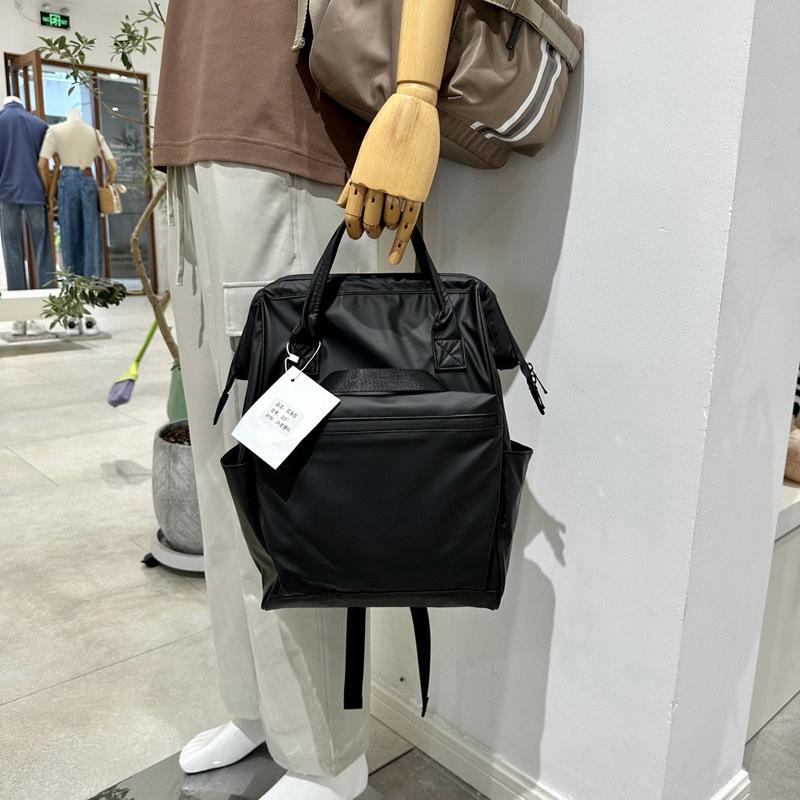 Značka módního návrháře Dámský a pánský batoh Trendy styl Taška na notebook 15,6 palce PU kůže Businessový ruksak Dámská školní taška