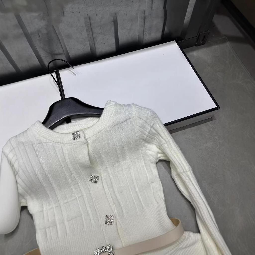 French Elegant Spring Knit Cardigan: Solid Color, Round Neck, Slimming Waist-Cinch, Long Sleeve, Versatile Top