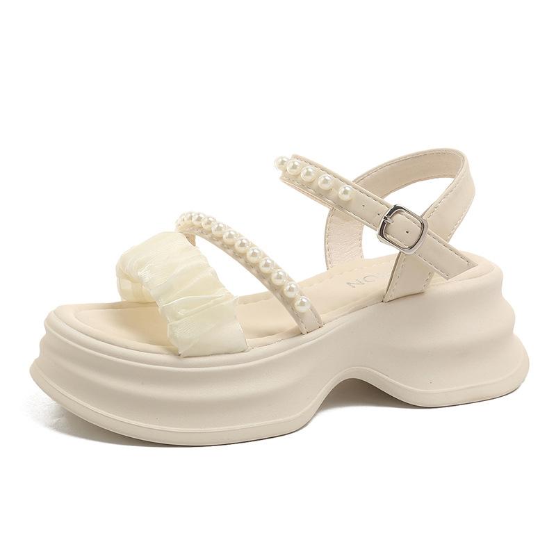 thick-soled pearl one-word buckle fairy wind sandals female 2025 summer Korean version new muffin casual beach sandals female