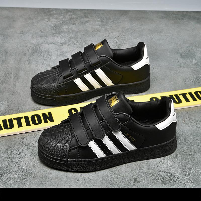 

Children s shell head board shoes Putian three bars classmates students moral training shoes Velcro popular platform casual white shoes 40