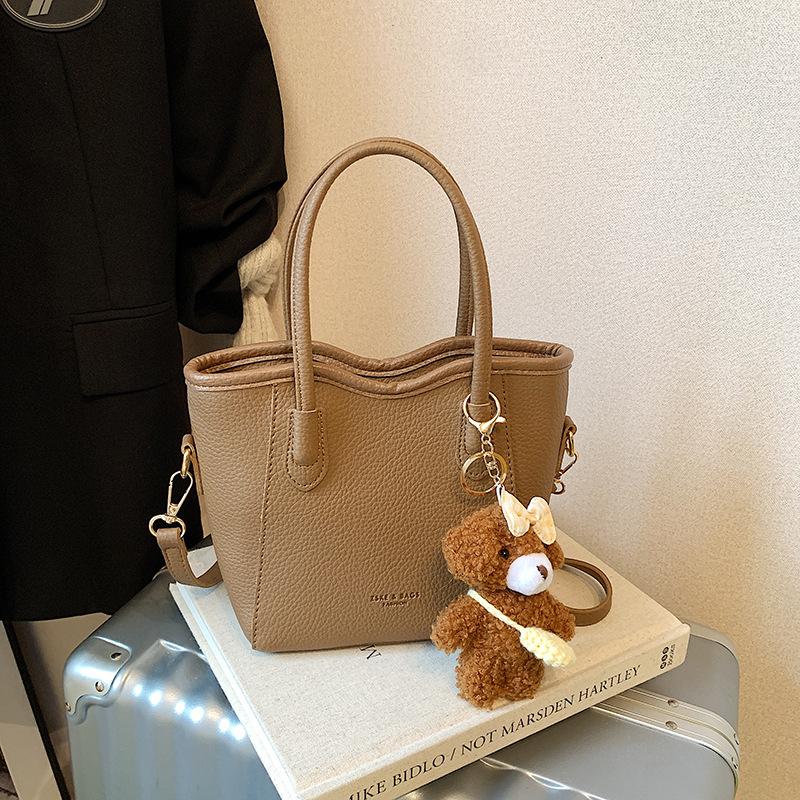 Premium Textur ausländischer Stil tragbare Bucket Bag Damen 2025 neu vielseitige Mode Gemüsekorb einzelne Schulter Messenger Damenhandtasche