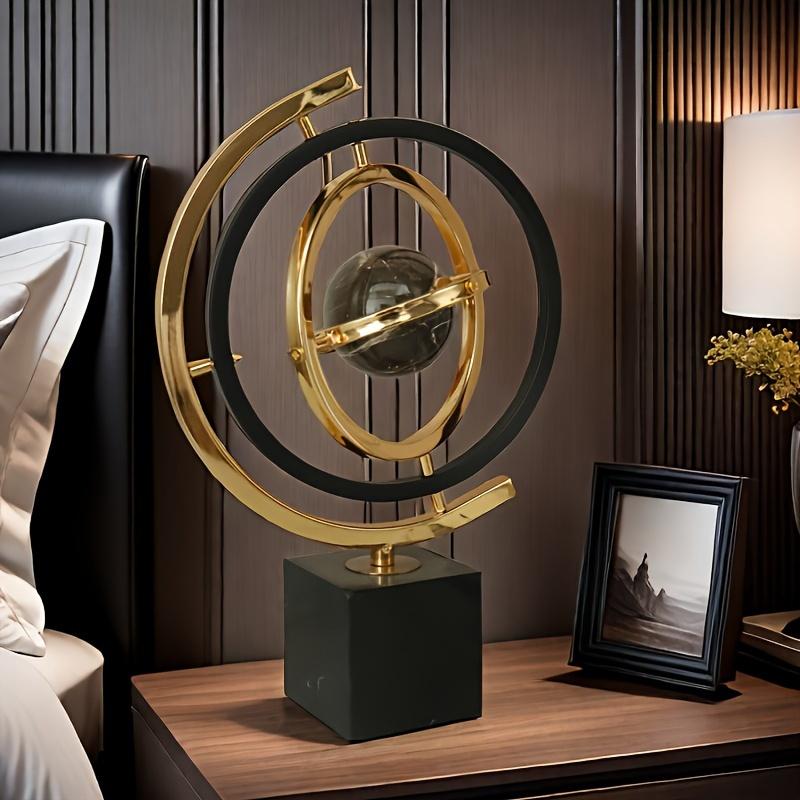 360-Degree Rotating Modern Abstract Metal Globe Sculpture with Rectangular Stand - Black & Golden Art Decor for Home or Office