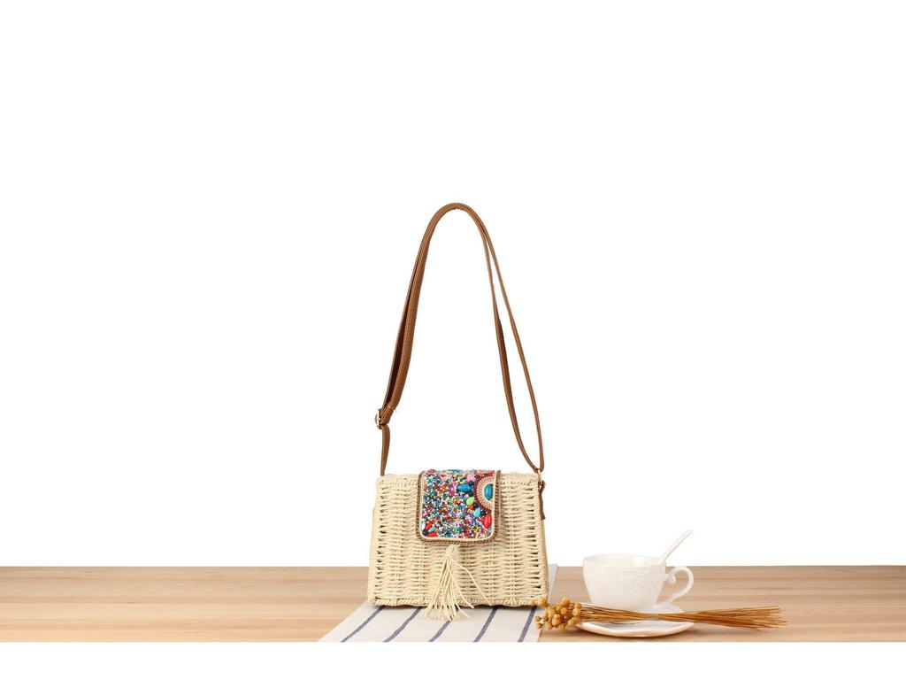 Minimalistisk vävd crossbody-väska i pappersrep för semester vid havet