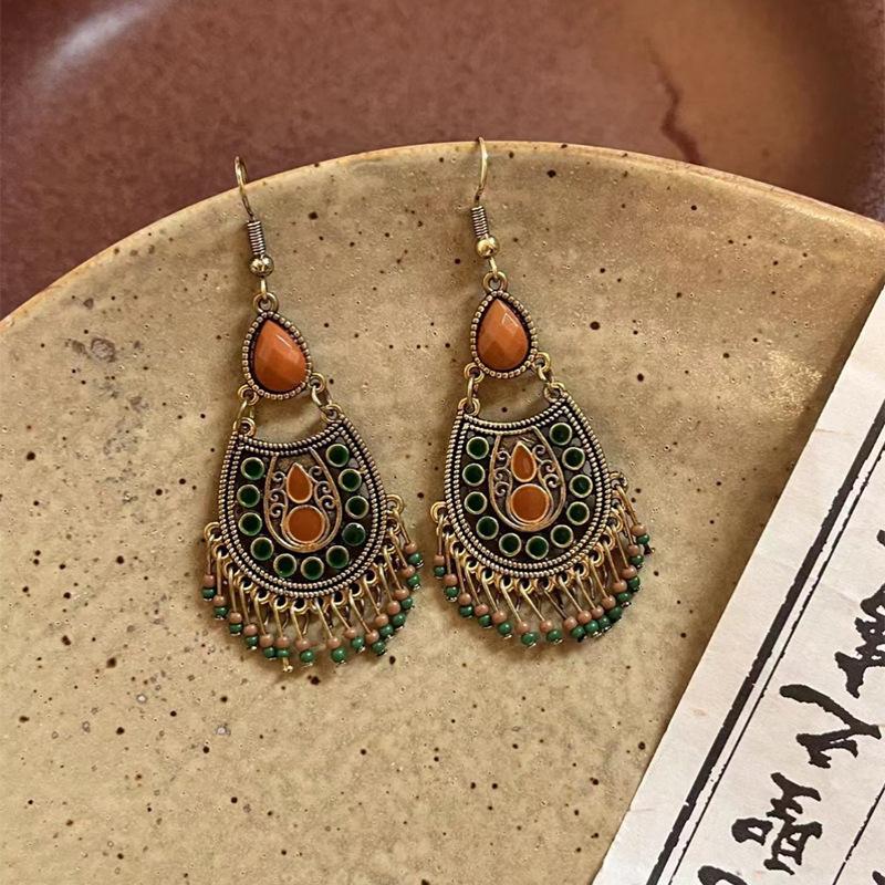 Chinese style dripping oil, water dripping rice beads, fringed ear hooks, retro earrings, personalized creativity, high-end earrings, women