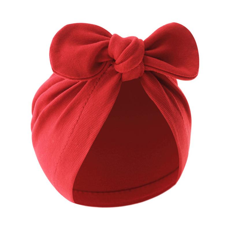 

Детская шапочка-бабочка с завязанным узлом