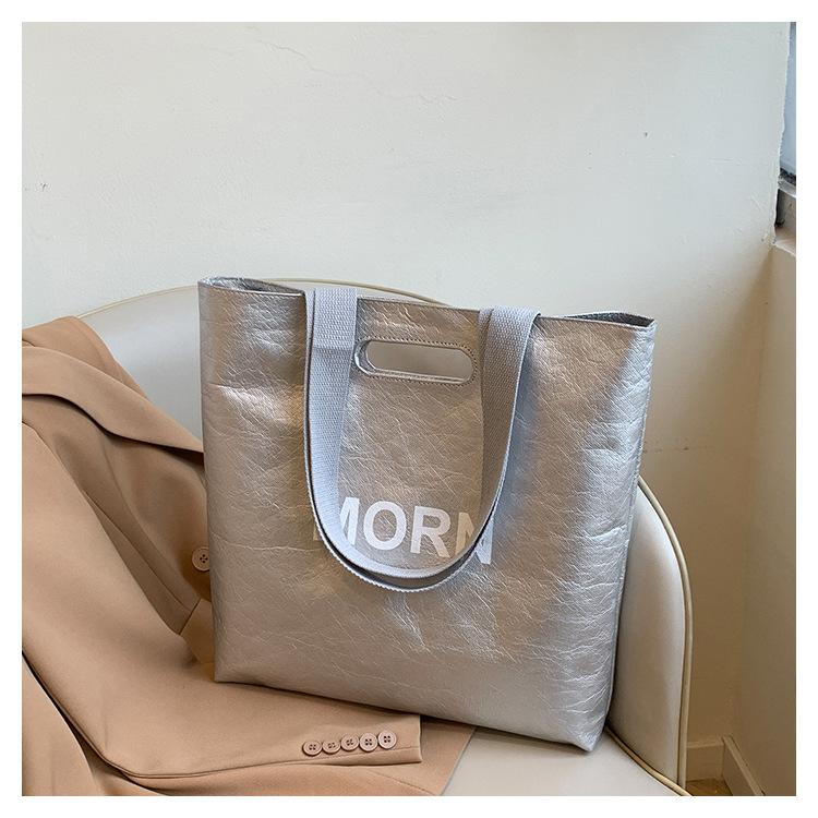 

2025 spring and summer new shoulder bag women s polyester bag Japanese casual versatile commuter bag work commuter women s bag срібний