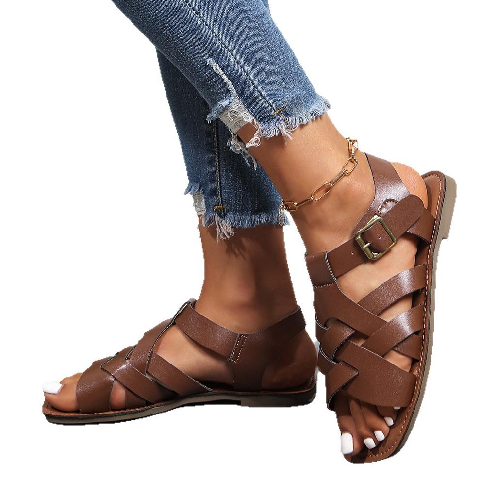 Retro style hand-woven flat-soled sandals women's 2025 summer outer wear new hollowed-out T-buckle Roman sandals
