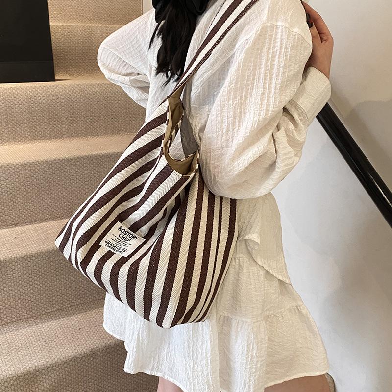 Large-capacity canvas bag women's 2025 new casual contrasting color versatile shoulder handbag, college student class tote bag