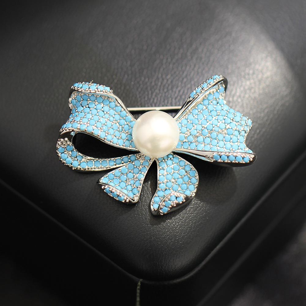 

Премиальное чувство нишевая синяя циркониевая брошь-бант темперамент универсальная натуральный пресноводный жемчуг сладкая булавка женская