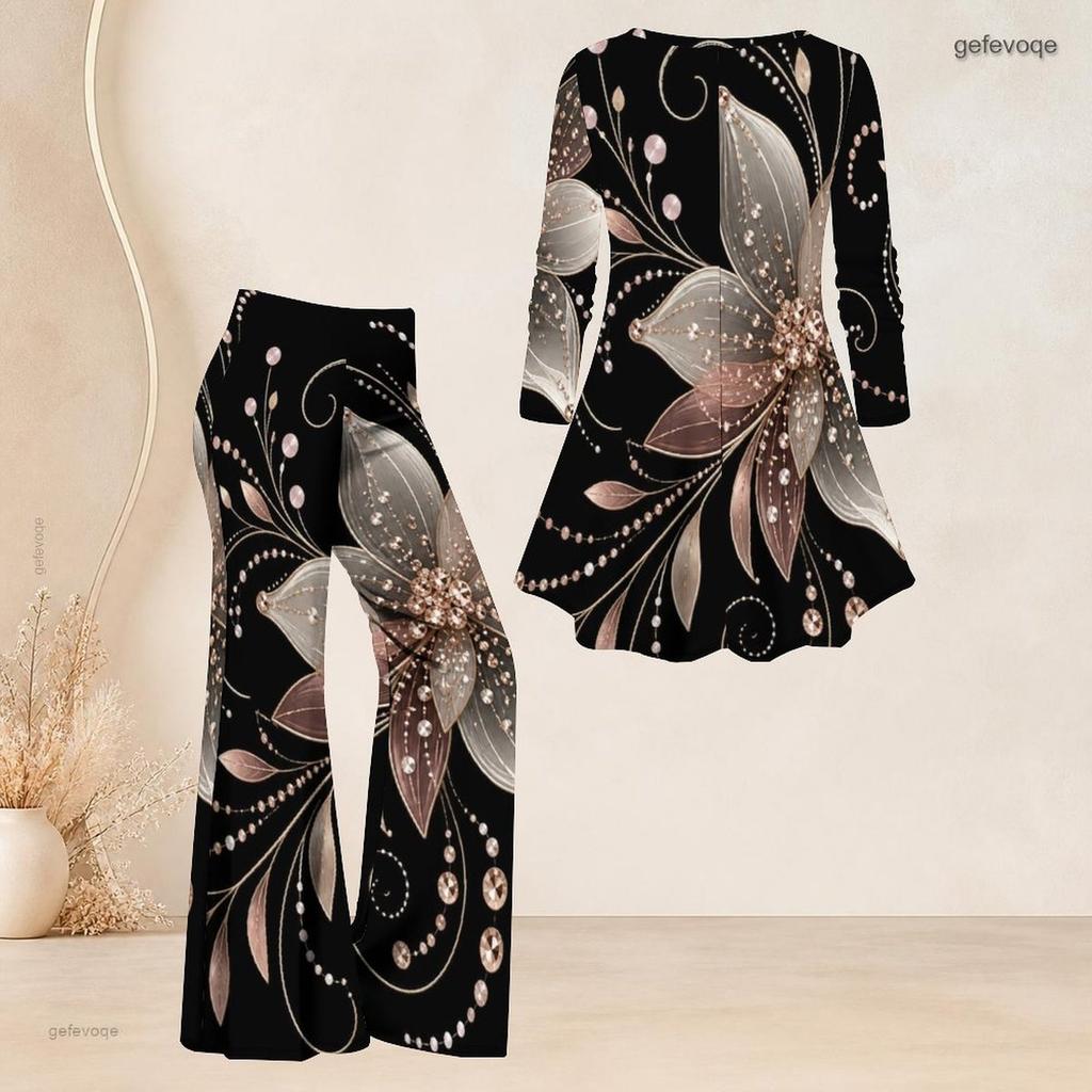 Women Plus Size Black Printed V Neck Three Quarter Sleeve Flared Top And Flared Pants Two Piece Set