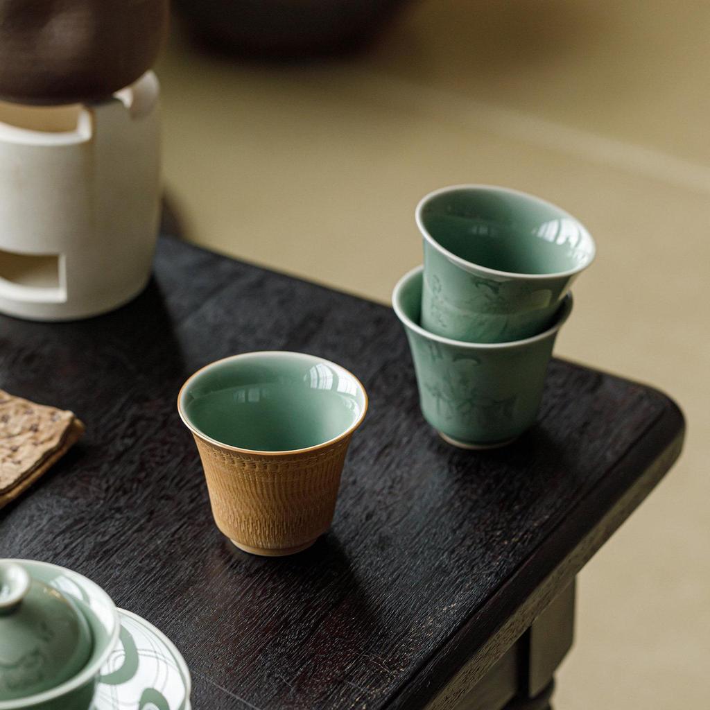 Guanlan Yue Celadon Four Beauties Tea Cup: Ceramic Shadow Carved Personal Tasting Cup