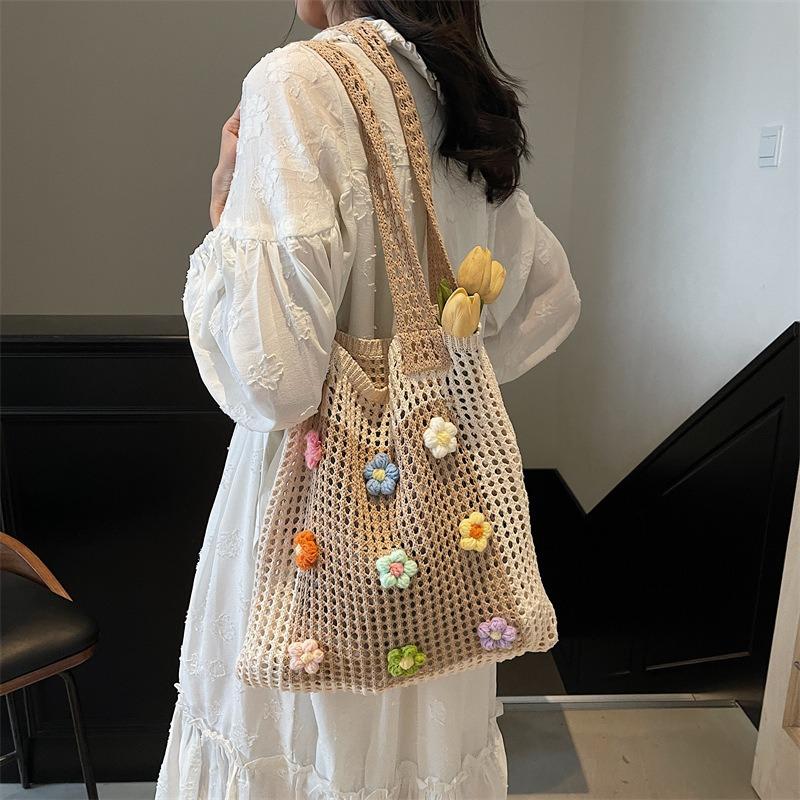 Slack stickad väska med stor kapacitet dam ny pendlar axelväska lat vind ihålig toteväska