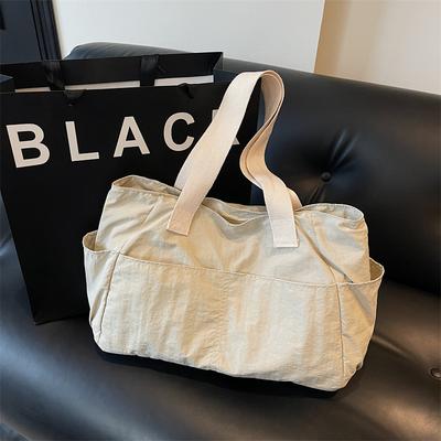 Sac à bandoulière commuter simple mode couleur unie grande capacité nouveau automne populaire décontracté mode sac à main marée