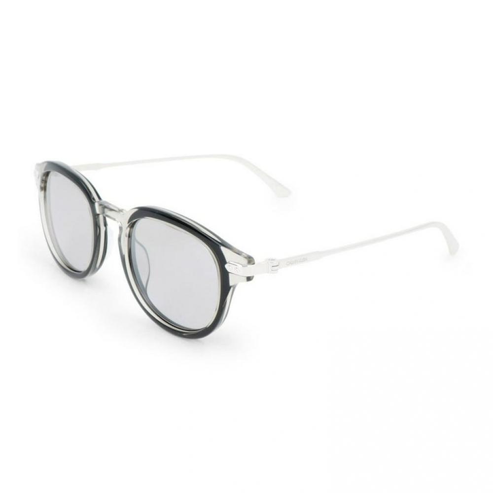 

Calvin Klein Unisex 54 мм Серые солнцезащитные очки CK18708SA 072 кристально-серые