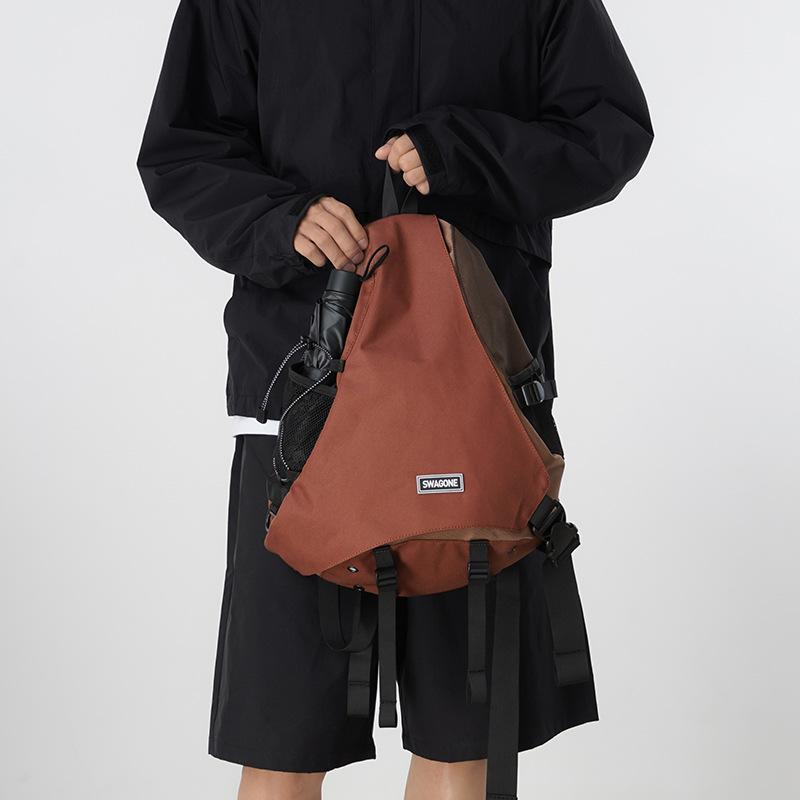Fashion trendy cool outdoor mountaineering travel men and women with the same backpack contrasting colors large capacity shoulder messenger bag