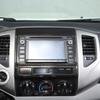 For Toyota Tacoma 2011-2015 ABS Carbon Fiber/Red Car Central Control Air Conditioning Vent Decorative Frame Car Accessories