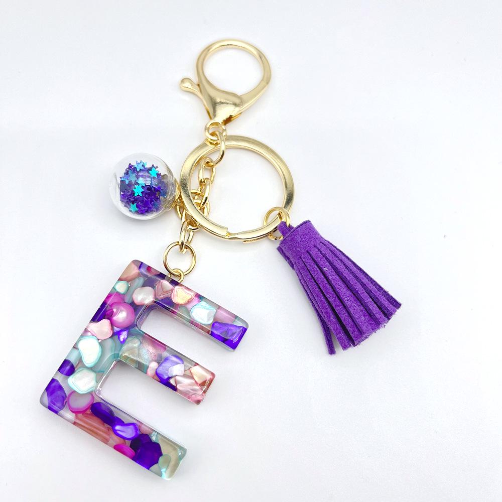 Breloc inițial englezesc de vânzare la cald european și american cu accesoriu cu ciucuri violet