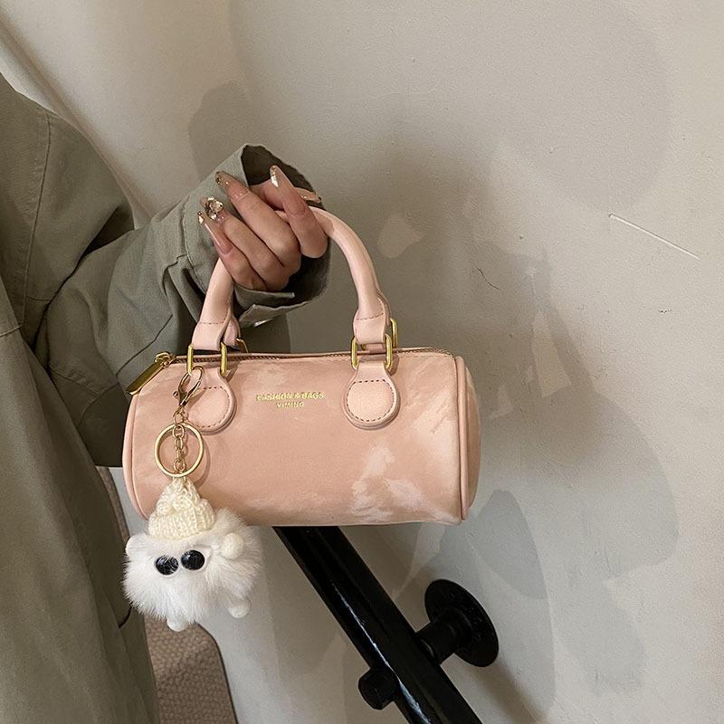 Small bags are popular today, women's new spring and summer versatile messenger bags, handbags, cylindrical bags.