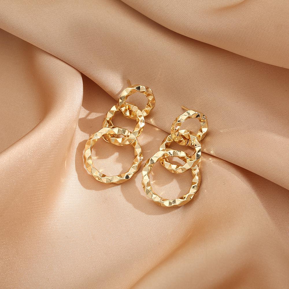 

2023 Trendy Geometric Three-Ring Copper Dangle Earrings - Fashionable and Modern Design