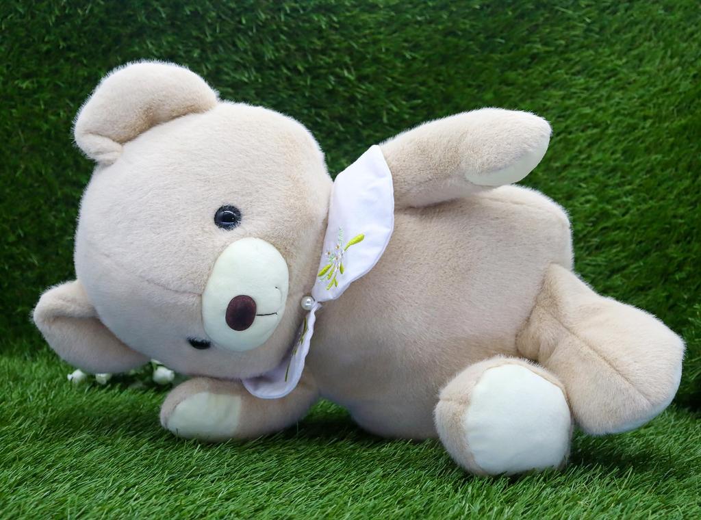 Take Off Bear Cub a retro bear with a cute floral embroidery on the beige plush toy with music Drop, pastel-colored collar. Large, box.