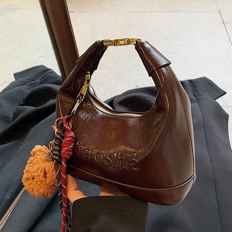 Bag New Autumn and Winter Leather Women's Bag High Sense Maillard Popular Fashion Hand Carry Crossbody Bag Luggage