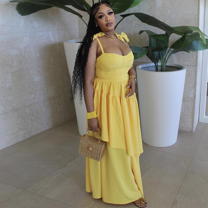 In stock, European and American women's clothing spring and summer new bow suspender V-neck ruffle edge long dress dress