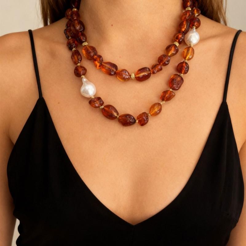 Stylish Red Resin Irregular Bead Necklace With Adjustable Length For Personalized Fit And Artistic Design In Sturdy Alloy Construction.